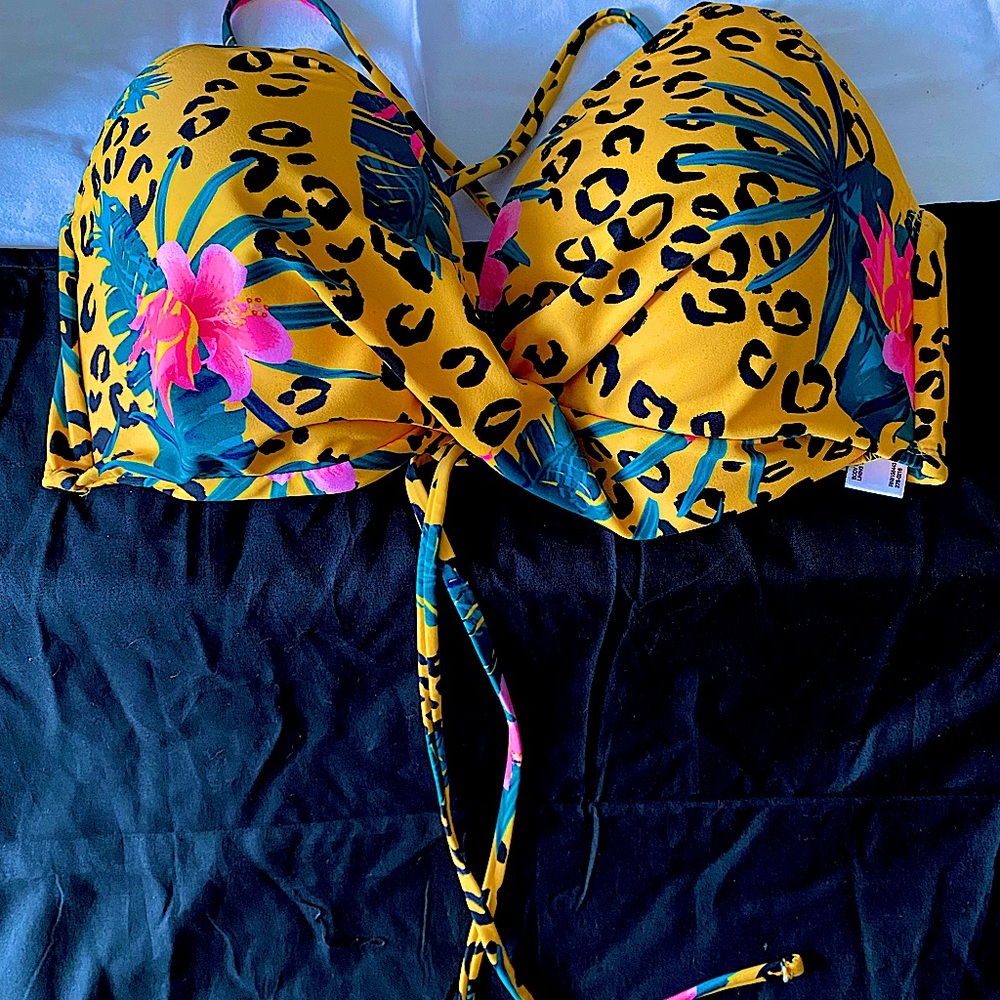 Women’s island floral bikini top and black swimsuit shorts